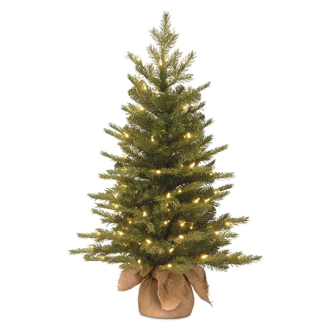 National Tree Company Pre-Lit 'Feel Real' Artificial Mini Christmas Tree, Green, Nordic Spruce, White Lights, Includes Burlap Bag Base, 3 Feet | BigEasyMart.com